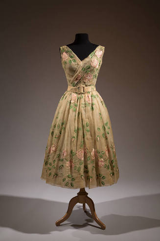 Off-white two-piece sleeveless, v-neck dress embroidered with green and pink roses with matchin…