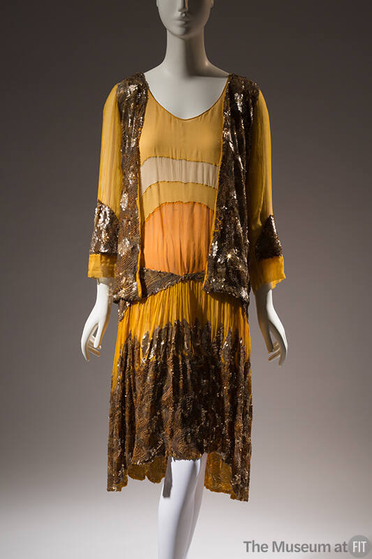 Gold sequin cardigan crocheted on yellow chiffon in wave pattern; yellow evening dress, appliqu…
