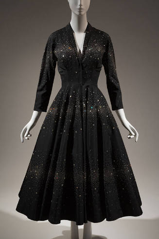 Black ankle length cocktail dress with horizontal bands of rhinestones, ¾ sleeves, V-neckline, …