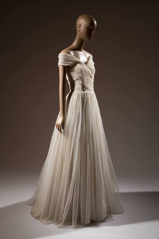 Ivory tulle floor length ballgown with off-the-shoulder halter style bodice and full skirt