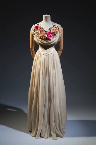 Ivory sleeveless floor length debutante dress with pink roses in deep bodice cowl