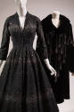 Black dress with silver sparkles with matching black coat with crystal seed beads in a comet de…