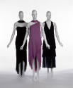 Two black evening dresses and one purple evening dress with asymmetrical hem, all sleeveless