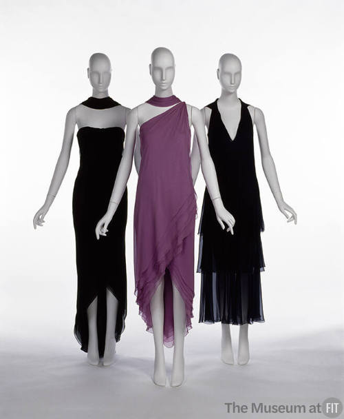 Two black evening dresses and one purple evening dress with asymmetrical hem, all sleeveless