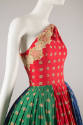 Red, green, and blue dress with spaced print in yellow, red, blue, and black; fitted one should…