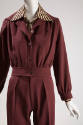 Pantsuit: brown/red jacket with striped collar and matching pants