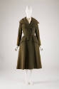 Green double breasted coat, fitted waist and flare skirt