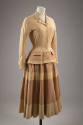 Light yellow fitted suit jacket with banded tan and yellow skirt