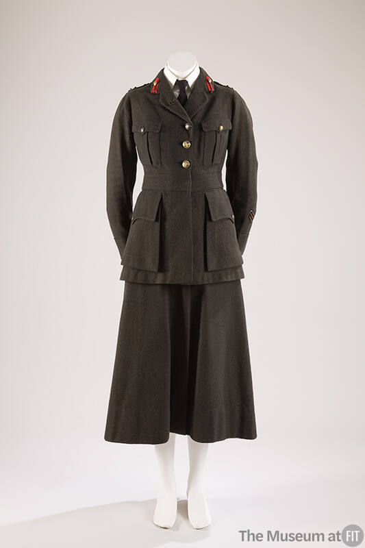 Dark grey/green military jacket with red pins on lapels, three gold buttons and patch pockets o…
