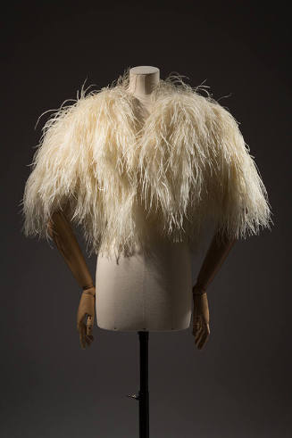 White ostrich feather bolero with feathers touching to elbows