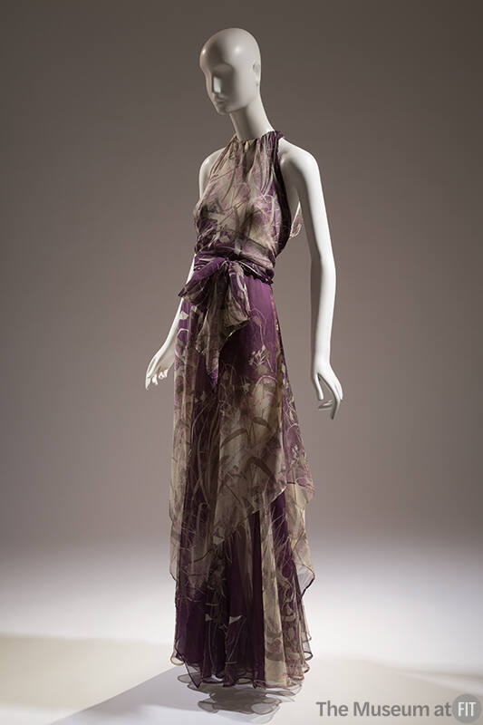 Purple with grey foliage print halter neck floor length gown, tie at waist and handkerchief hem