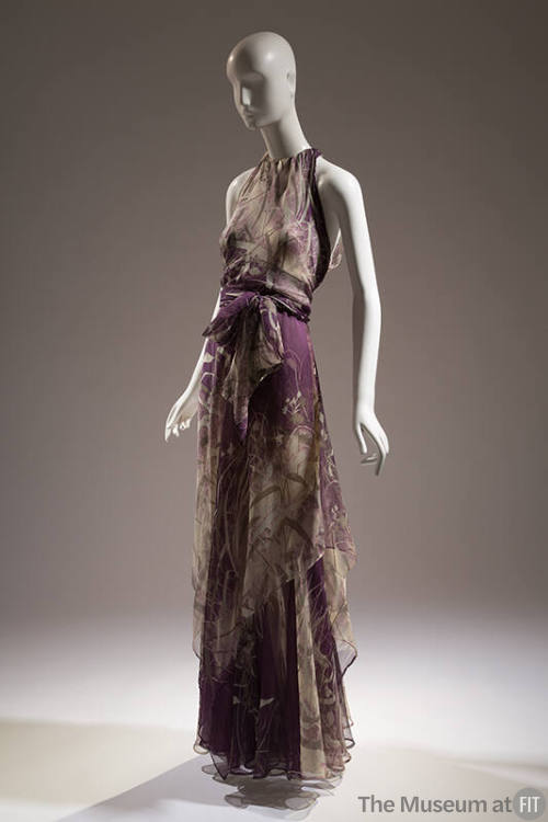 Purple with grey foliage print halter neck floor length gown, tie at waist and handkerchief hem