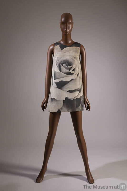 Sleeveless A-line mini dress with large scale black and white print of a rose