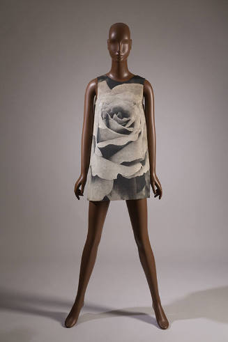 Sleeveless A-line mini dress with large scale black and white print of a rose