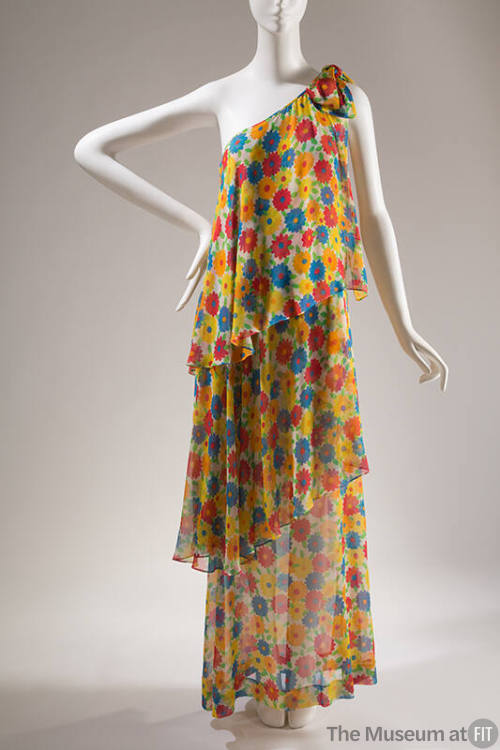One shoulder floor length dress with three tiered layers and allover red, yellow, blue, orange …