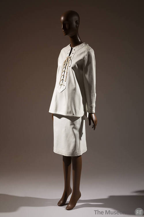 White lace-up tunic top and white to-the-knee skirt 
