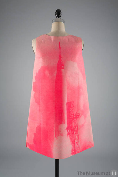 Pink sleeveless mini dress printed with rocket launch image