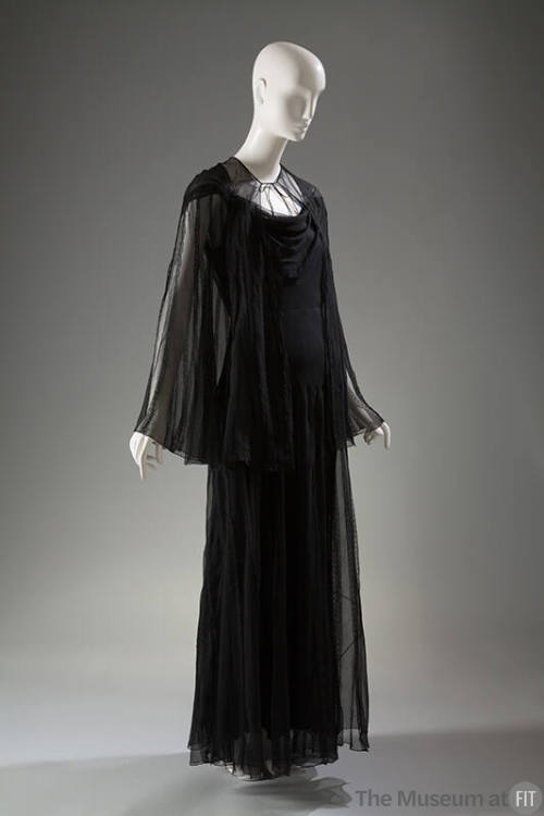 Black floor length night gown with black sheer long sleeve cape