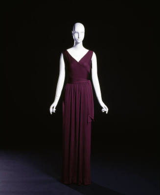 Purple sleeveless floor length gown with tie sash 