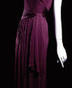 Detail of purple gown tie sash and pleated skirt 
