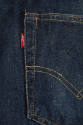 Detail of blue denim jeans back pocket and red Levi's tag