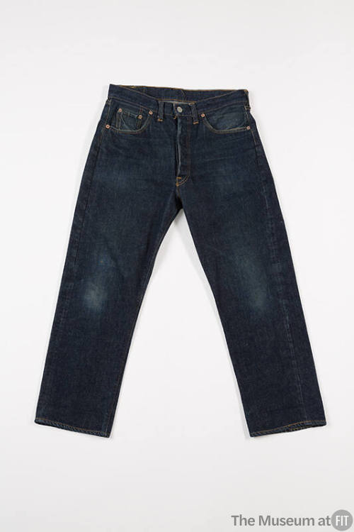 Blue denim zip and one button front jeans with two slash pockets, ticket pocket and belt loops