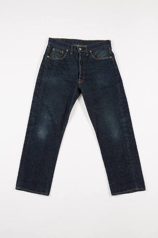 Blue denim zip and one button front jeans with two slash pockets, ticket pocket and belt loops
