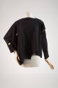 Black long sleeve patchwork top and cutouts and uneven hem