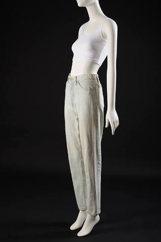 Light blue denim jeans with yellow topstitching, pockets and belt loops