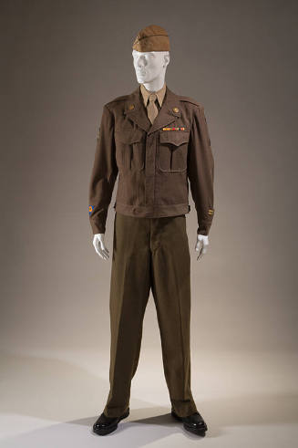 Brown Army uniform jacket with front patch pockets, gold lapel pins and patches, light brown sh…