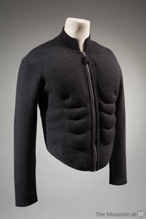 Grey wool long sleeve zip front jacket with stitched and padded abdominal muscles