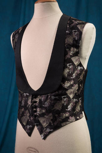 Man’s black jacquard vest with Alice in Wonderland design in light purple, beige and white, wit…