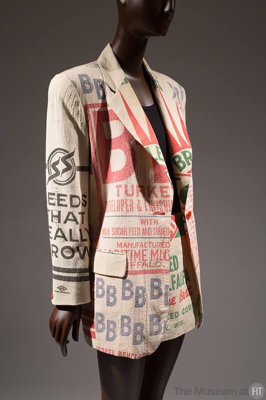 Off white oversized jacket with screen printed multicolor words and logo, matching mini skirt