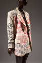 Off white oversized jacket with screen printed multicolor words and logo, matching mini skirt