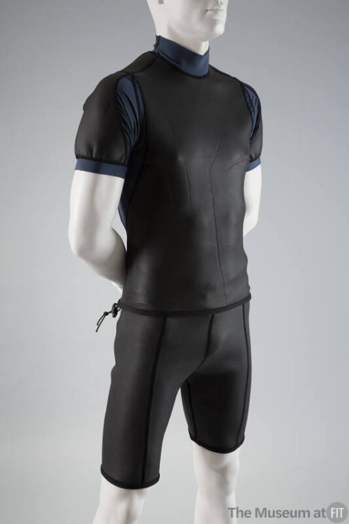 Black short sleeve scuba top with high neck, and knee length trunks