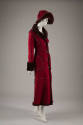 ¾ view of dark red coat and hat showing fur trim throughout coat and oversize brim of fur trimm…