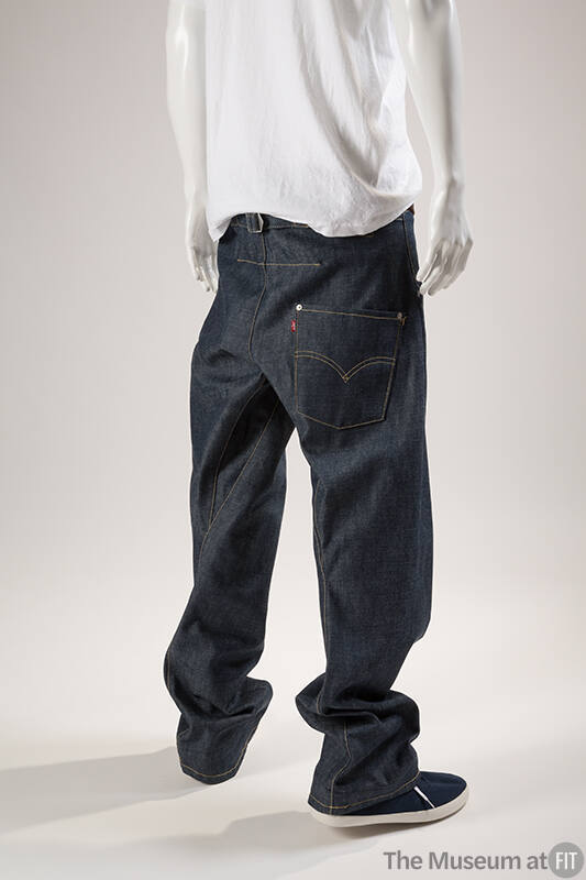 Back view of baggy blue denim jeans with large back pocket