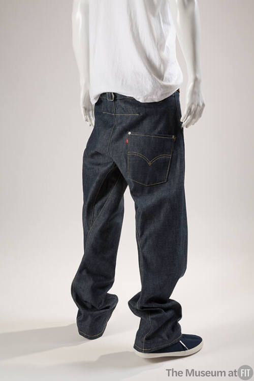 Back view of baggy blue denim jeans with large back pocket