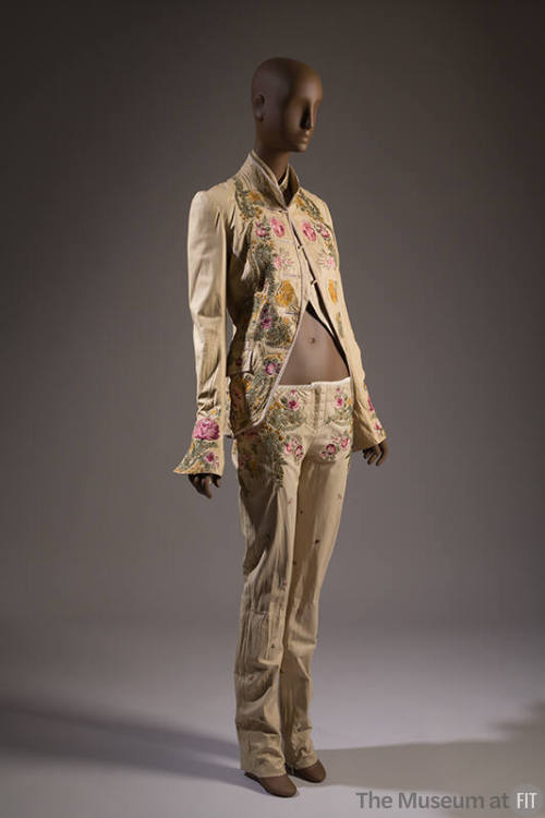 Three-piece light beige pantsuit ebmroidered with large floral design inspired by 18th century …