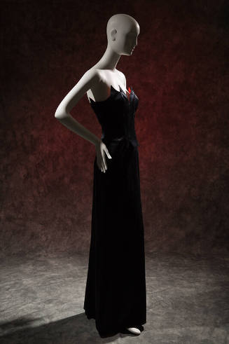 Black evening set: boned bustier with flamed shaped edges lined with red silk; long skirt