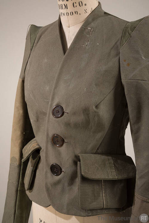 Green distressed three button military style long sleeve jacket with flap pockets