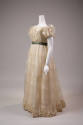 Floor length off-white sheer organza dress with ivory floral pattern, puffy short sleeves, gree…