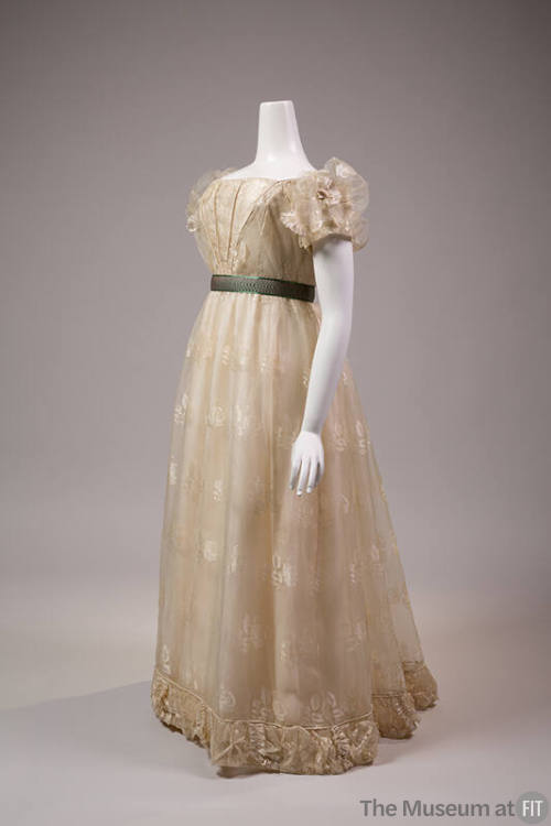 Floor length off-white sheer organza dress with ivory floral pattern, puffy short sleeves, gree…