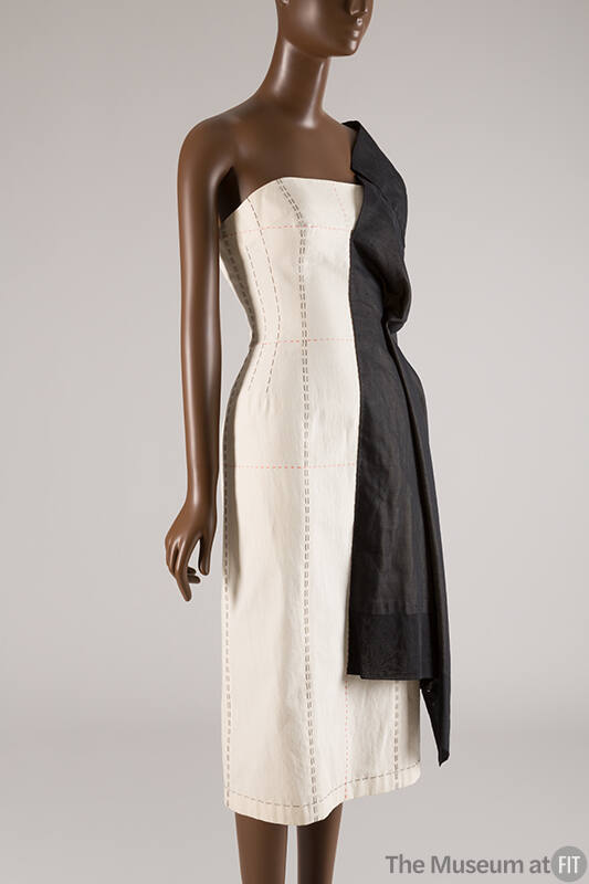 Off-white one shoulder below-the-knee dress with black and red  topstitching, one long black co…