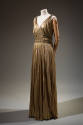 Gold metalic Grecian Goddess style sleeveless dress and coordinating ivory floor length slip