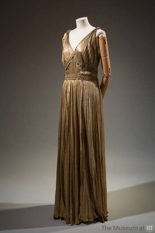 Gold metalic Grecian Goddess style sleeveless dress and coordinating ivory floor length slip