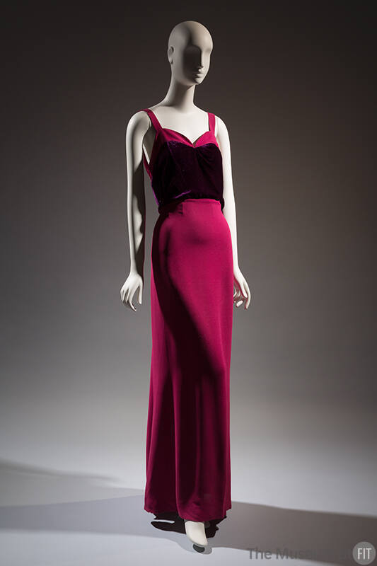 Dark pink sleeveless floor length evening dress with camisole straps, sweetheart neckline and p…