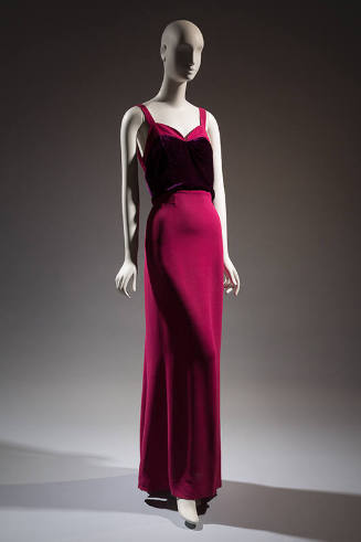 Dark pink sleeveless floor length evening dress with camisole straps, sweetheart neckline and p…
