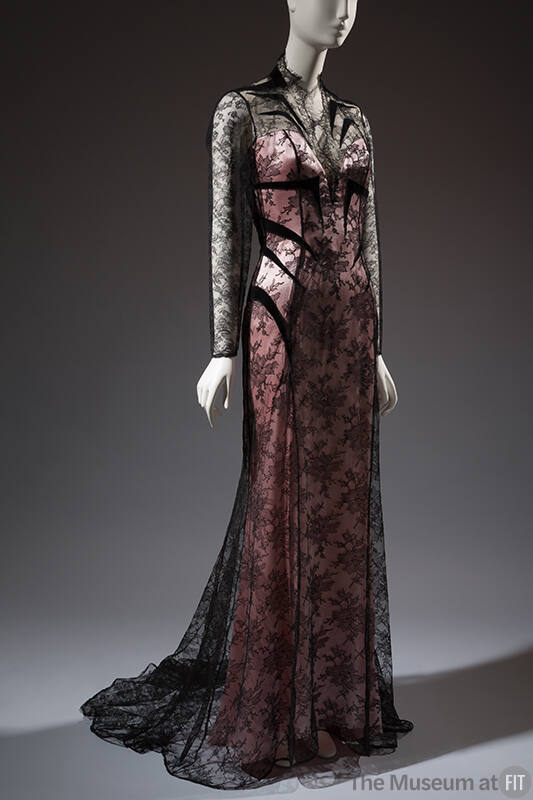 Black Chantilly lace floor length long sleeve evening dress with pink underdress, black stylize…