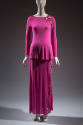 Hot pink evening set of long sleeve top and floor length skirt with cut outs and embellishments…